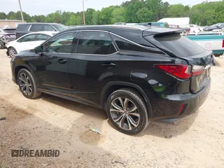 2019 Lexus RX with VIN 2T2ZZMCA6KC150398, listed as a IAAI auction lot 42080027 with 68,598 mi miles. Bid and sale history available at carsss.com. Image 3.