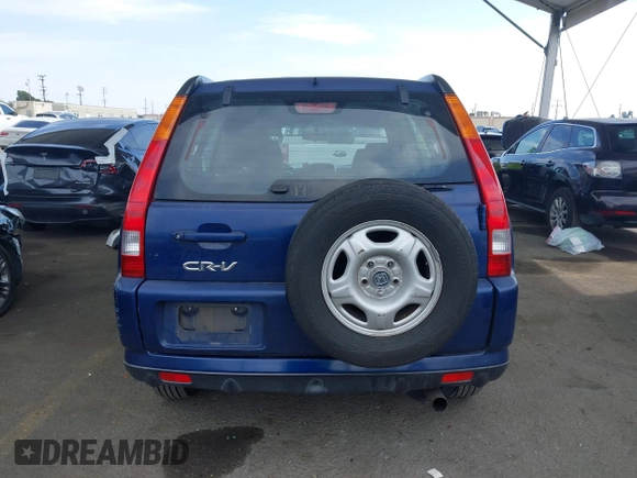 2004 Honda CR-V LX with VIN JHLRD684X4C023539, listed as a IAAI auction lot 42032809 with 186,056 mi miles and . Bid and sale history available at carsss.com. Image 16.