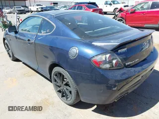 2008 Hyundai Tiburon GT z VIN KMHHN66F28U280572, wystawiony jako IAAI lot #41824507 z przebiegiem 189 851 mil mil oraz . Historia ofert i sprzedaży dostępna na DreamBid. Obrazek 3.
