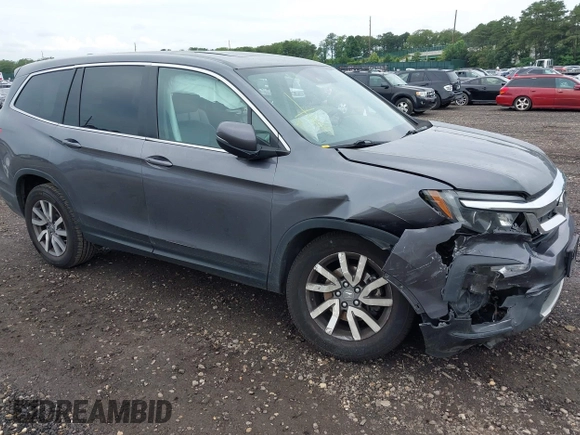 2019 Honda Pilot EX-L with VIN 5FNYF6H5XKB096065, listed as a IAAI auction lot 42631239 with 171,768 mi miles and . Bid and sale history available at DreamBid. Image 1.