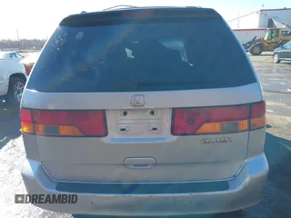 2004 Honda Odyssey EX z VIN 5FNRL18674B080319, wystawiony jako IAAI lot #40819411 z przebiegiem 201 820 mil mil oraz . Historia ofert i sprzedaży dostępna na DreamBid. Obrazek 17.