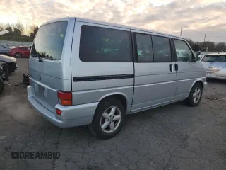 2003 Volkswagen EuroVan MV с VIN WV2MB47053H002505, выставлен на аукционе Copart как лот 83840884 с пробегом 250 786 миль миль и Чистый • Clean title. История ставок и продаж доступна на DreamBid. Изображение 3.