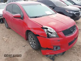 2012 Nissan Sentra SE-R z VIN 3N1BB6AP2CL648306, wystawiony jako IAAI lot #41399972 z przebiegiem 159 061 mil mil oraz . Historia ofert i sprzedaży dostępna na DreamBid. Obrazek 1.