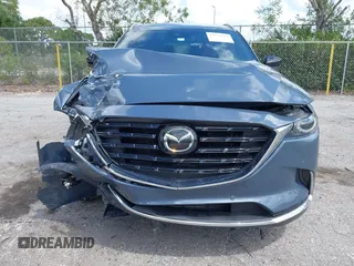 2021 Mazda CX-9 Carbon Edition with VIN JM3TCADY3M0517722, listed as a IAAI auction lot 41951164 with 43,868 mi miles and . Bid and sale history available at carsss.com. Image 13.