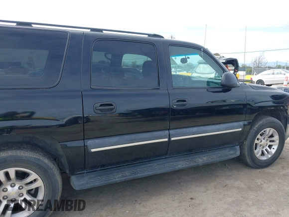 2003 Chevrolet Suburban LS with VIN 3GNEC16T03G334122, listed as a IAAI auction lot 41860521 with 195,648 mi miles. Bid and sale history available at carsss.com. Image 13.