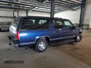 1999 Chevrolet Suburban with VIN 3GNEC16R5XG218523, listed as a Copart auction lot 72568494 with 297,020 mi miles and Salvage Title. Bid and sale history available at DreamBid. Image 3.