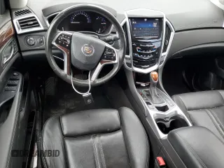 2014 Cadillac SRX Performance Collection z VIN 3GYFNFE31ES664836, wystawiony jako Copart lot #50315595 z przebiegiem 11 597 mil mil oraz Czysty tytuł • Clean title. Historia ofert i sprzedaży dostępna na DreamBid. Obrazek 8.