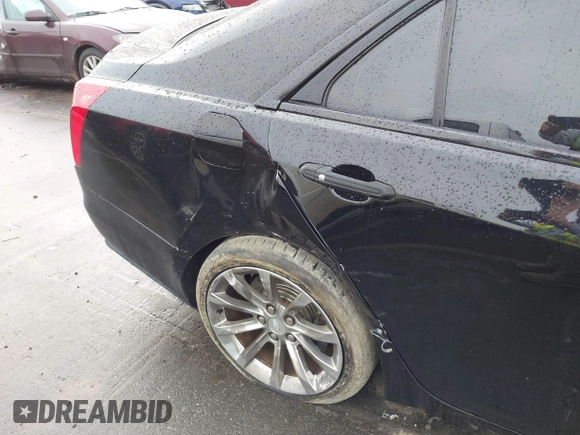 2017 Cadillac CTS Luxury AWD with VIN 1G6AX5SS4H0135377, listed as a IAAI auction lot 41442999 with 86,804 mi miles and . Bid and sale history available at DreamBid. Image 18.