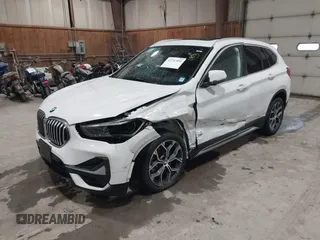 2021 BMW X1 xDrive28i with VIN WBXJG9C04M5T82884, listed as a IAAI auction lot 42242890 with 24,647 mi miles and . Bid and sale history available at DreamBid. Image 2.