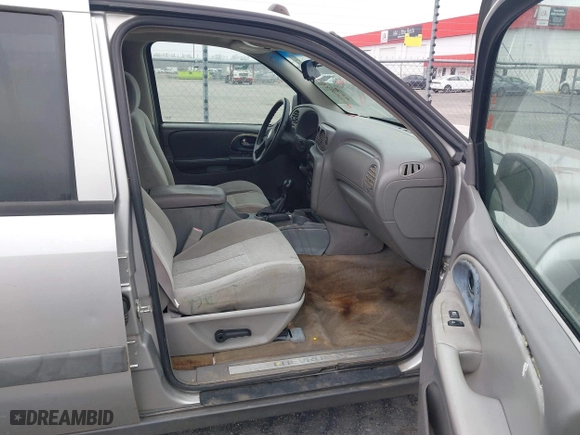 2005 Chevrolet TrailBlazer LS with VIN 1GNES16S956112497, listed as a IAAI auction lot 41486711 with 243,719 mi miles. Bid and sale history available at carsss.com. Image 5.