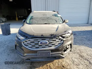 2020 Ford Edge SE z VIN 2FMPK3G91LBA42481, wystawiony jako Copart lot #50135885 z przebiegiem 104 656 mil mil oraz Nie do naprawy • Non repairable. Historia ofert i sprzedaży dostępna na DreamBid. Obrazek 5.