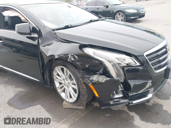 2018 Cadillac XTS Luxury with VIN 2G61M5S33J9119684, listed as a IAAI auction lot 41659807 with 107,156 mi miles and . Bid and sale history available at DreamBid. Image 16.