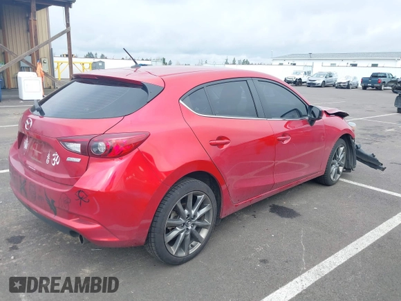 2018 Mazda 3 Touring with VIN 3MZBN1L33JM187560, listed as a IAAI auction lot 41692954 with 58,396 mi miles. Bid and sale history available at carsss.com. Image 4.