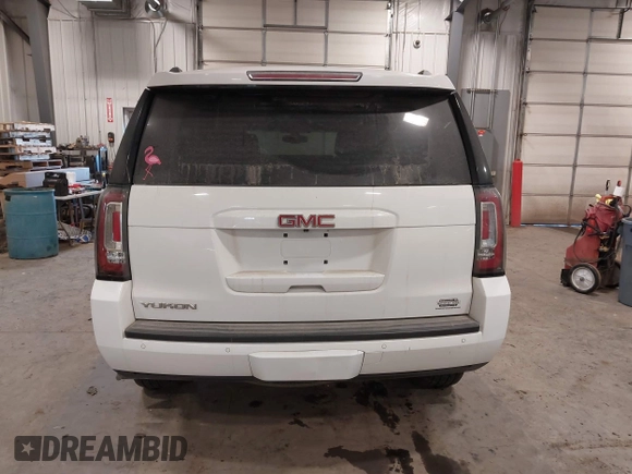 2015 GMC Yukon SLE with VIN 1GKS2AKC6FR103447, listed as a IAAI auction lot 41596220 with 104,209 mi miles. Bid and sale history available at carsss.com. Image 16.