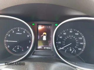 2017 Hyundai Santa Fe 2.4L z VIN 5XYZU3LB4HG462058, wystawiony jako IAAI lot #41861190 z przebiegiem 87 102 mil mil oraz . Historia ofert i sprzedaży dostępna na DreamBid. Obrazek 7.