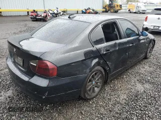 2007 BMW 3 Series 328xi with VIN WBAVC93517KX58143, listed as a Copart auction lot 52036035 with 161,954 mi miles and Salvage title. Bid and sale history available at DreamBid. Image 3.