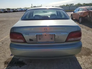 1999 Mazda 626 ES with VIN 1YVGF22C4X5887335, listed as a Copart auction lot 51726654 with 147,359 mi miles and Salvage Title. Bid and sale history available at carsss.com. Image 6.