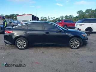 2018 Kia Optima LX with VIN 5XXGT4L38JG256924, listed as a IAAI auction lot 41267413 with 129,820 mi miles and . Bid and sale history available at DreamBid. Image 13.
