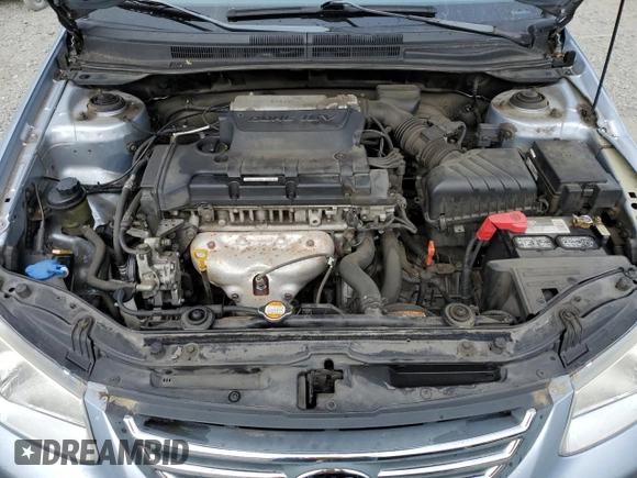 2008 Kia Spectra EX z VIN KNAFE121085529600, wystawiony jako Copart lot #59727105 z przebiegiem 132 306 mil mil oraz Szkoda całkowita • Salvage title. Historia ofert i sprzedaży dostępna na DreamBid. Obrazek 11.