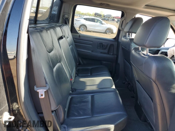 2013 Honda Ridgeline RTL z VIN 5FPYK1F52DB004376, wystawiony jako Copart lot #55990375 z przebiegiem 127 762 mil mil oraz Szkoda całkowita • Salvage title. Historia ofert i sprzedaży dostępna na DreamBid. Obrazek 10.