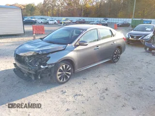 2019 Nissan Sentra S z VIN 3N1AB7APXKY265054, wystawiony jako IAAI lot #40929593 z przebiegiem 75 298 mil mil oraz . Historia ofert i sprzedaży dostępna na DreamBid. Obrazek 18.
