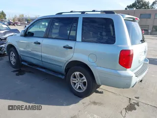 2003 Honda Pilot EX with VIN 2HKYF18463H543326, listed as a IAAI auction lot 41837876 with 215,263 mi miles. Bid and sale history available at carsss.com. Image 3.