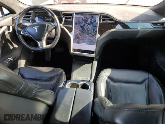 2016 Tesla Model S 90D with VIN 5YJSA1E2XGF133933, listed as a Copart auction lot 60736445 with 203,063 mi miles and Salvage title. Bid and sale history available at DreamBid. Image 8.