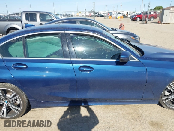 2021 BMW 3 Series 330i z VIN 3MW5R1J03M8B71429, wystawiony jako IAAI lot #42290683 z przebiegiem Nie podano mil oraz . Historia ofert i sprzedaży dostępna na DreamBid. Obrazek 13.