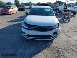 2018 Volkswagen Jetta 1.4T SE with VIN 3VWDB7AJXJM225016, listed as a IAAI auction lot 41309884 with 57,773 mi miles. Bid and sale history available at carsss.com. Image 11.