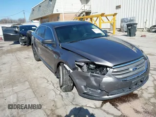 2013 Ford Taurus SEL z VIN 1FAHP2H83DG231000, wystawiony jako IAAI lot #41986420 z przebiegiem 200 390 mil mil oraz . Historia ofert i sprzedaży dostępna na DreamBid. Obrazek 1.