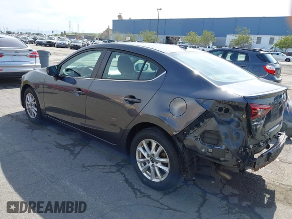 2015 Mazda Mazda3 i Touring with VIN 3MZBM1V74FM157512, listed as a IAAI auction lot 41844549 with 77,787 mi miles. Bid and sale history available at carsss.com. Image 3.