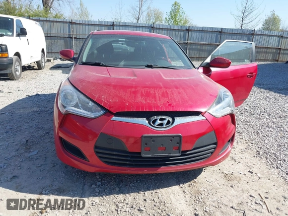 2014 Hyundai Veloster with VIN KMHTC6AD2EU214847, listed as a IAAI auction lot 42067728 with 77,421 mi miles. Bid and sale history available at carsss.com. Image 6.