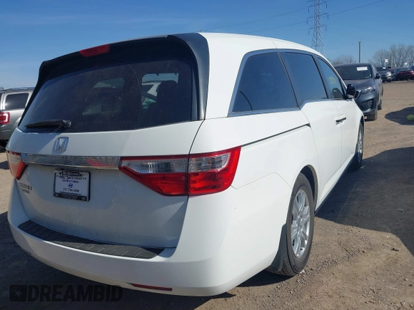 2011 Honda Odyssey EX-L with VIN 5FNRL5H69BB062666, listed as a IAAI auction lot 41829319 with 152,105 mi miles and . Bid and sale history available at carsss.com. Image 4.