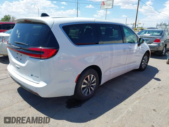 2024 Chrysler Pacifica Hybrid Select with VIN 2C4RC1S74RR153420, listed as a IAAI auction lot 42368593 with 19,829 mi miles and . Bid and sale history available at DreamBid. Image 4.