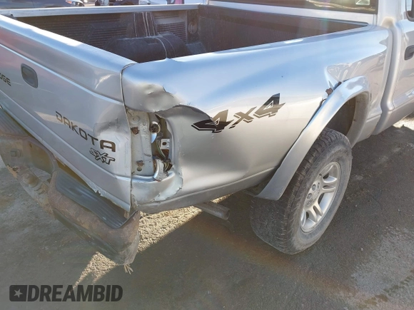 2004 Dodge Dakota Sport with VIN 1D7HG38K34S561735, listed as a IAAI auction lot 41409622 with Not Provided miles. Bid and sale history available at carsss.com. Image 17.