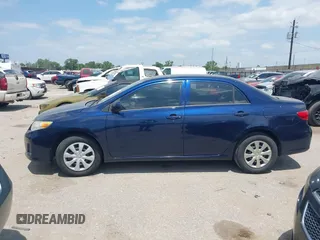 2013 Toyota Corolla L with VIN 5YFBU4EE9DP170801, listed as a IAAI auction lot 42035064 with 138,147 mi miles. Bid and sale history available at carsss.com. Image 14.