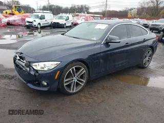 2016 BMW 4 Series 428i xDrive with VIN WBA4C9C59GG137067, listed as a IAAI auction lot 41913733 with 104,378 mi miles and . Bid and sale history available at carsss.com. Image 20.
