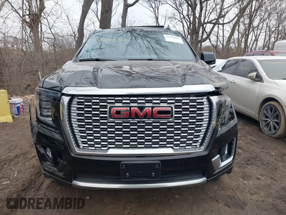 2021 GMC Yukon Denali with VIN 1GKS2DKL2MR474572, listed as a IAAI auction lot 41149462 with 51,888 mi miles. Bid and sale history available at carsss.com. Image 13.