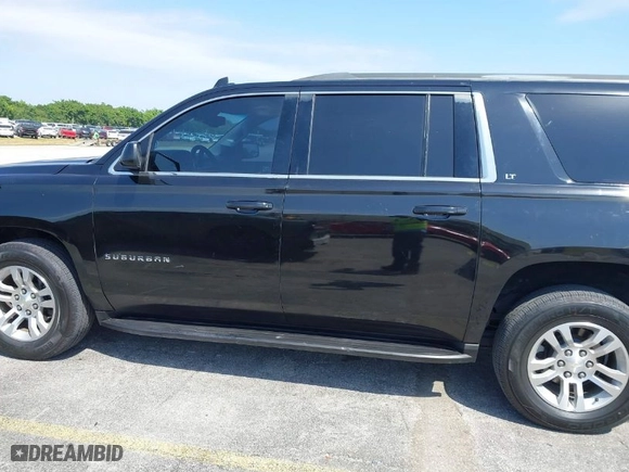 2018 Chevrolet Suburban LT with VIN 1GNSCHKC7JR111560, listed as a IAAI auction lot 41823175 with 136,751 mi miles. Bid and sale history available at carsss.com. Image 14.