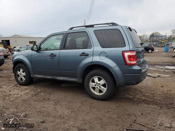 2010 Ford Escape XLT with VIN 1FMCU0D74AKD01784, listed as a Copart auction lot 52857725 with 119,448 mi miles and Salvage Title. Bid and sale history available at carsss.com. Image 2.
