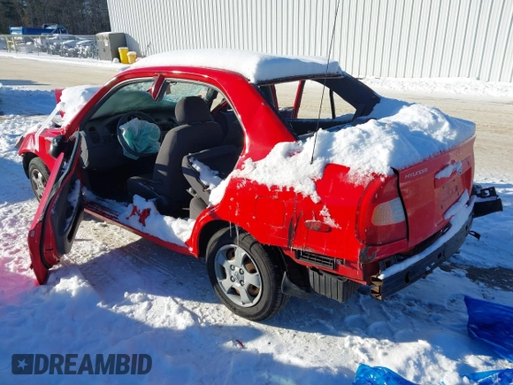 2002 Hyundai Accent GL with VIN KMHCG45C72U285130, listed as a IAAI auction lot 41373423 with 58,685 mi miles. Bid and sale history available at carsss.com. Image 3.