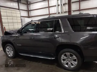 2016 GMC Yukon SLT z VIN 1GKS2BKC2GR320923, wystawiony jako IAAI lot #42196868 z przebiegiem 134 754 mil mil oraz . Historia ofert i sprzedaży dostępna na DreamBid. Obrazek 14.