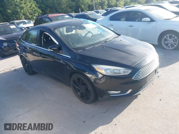 2016 Ford Focus Titanium with VIN 1FADP3J26GL335843, listed as a IAAI auction lot 42799795 with 167,506 mi miles and . Bid and sale history available at DreamBid. Image 1.