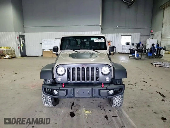 2018 Jeep Wrangler Unlimited Rubicon Recon z VIN 1C4HJWFG3JL830219, wystawiony jako Copart lot #47385325 z przebiegiem 121 679 mil mil oraz Szkoda całkowita • Salvage title. Historia ofert i sprzedaży dostępna na DreamBid. Obrazek 11.