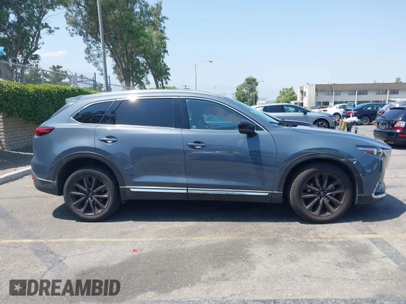 2022 Mazda CX-9 Grand Touring with VIN JM3TCBDY1N0611766, listed as a IAAI auction lot 42452059 with 60,755 mi miles and . Bid and sale history available at DreamBid. Image 13.