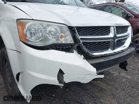 2012 Dodge Grand Caravan SE with VIN 2C4RDGBG9CR232038, listed as a IAAI auction lot 41823766 with 77,468 mi miles and . Bid and sale history available at DreamBid. Image 13.