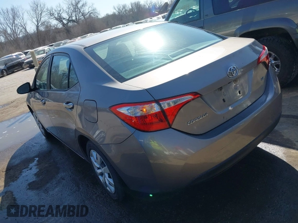 2015 Toyota Corolla L with VIN 5YFBURHE5FP345234, listed as a IAAI auction lot 41764976 with 221,888 mi miles and . Bid and sale history available at DreamBid. Image 3.