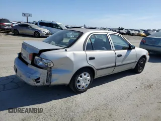 2002 Chevrolet Prizm z VIN 1Y1SK52862Z410699, wystawiony jako Copart lot #58118425 z przebiegiem 157 609 mil mil oraz Szkoda całkowita • Salvage title. Historia ofert i sprzedaży dostępna na DreamBid. Obrazek 3.