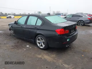 2014 BMW 3 Series 328i with VIN WBA3C1C55EK113128, listed as a IAAI auction lot 41259472 with 82,798 mi miles. Bid and sale history available at carsss.com. Image 3.