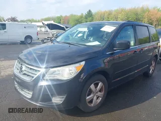 2011 Volkswagen Routan SE z VIN 2V4RW3DG3BR717246, wystawiony jako IAAI lot #42196697 z przebiegiem 155 375 mil mil oraz . Historia ofert i sprzedaży dostępna na DreamBid. Obrazek 17.
